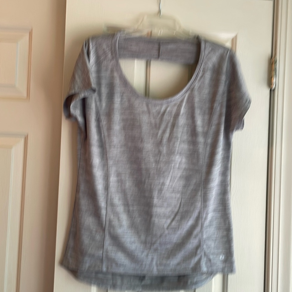Brand new women exercise top  in size medium